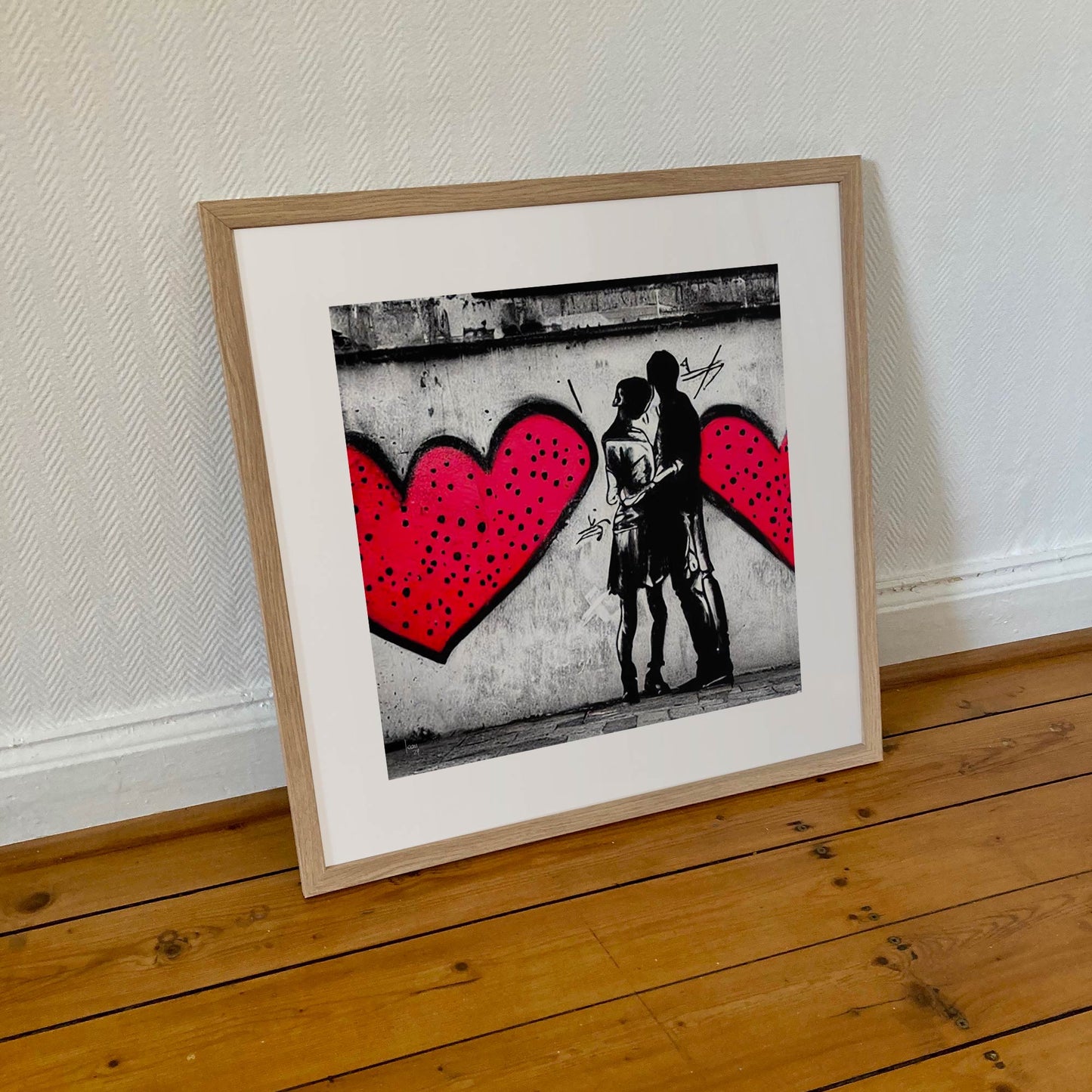 Tirage encadré de l'œuvre "Tandem", format 50x50 cm, parfait pour les intérieurs modernes.