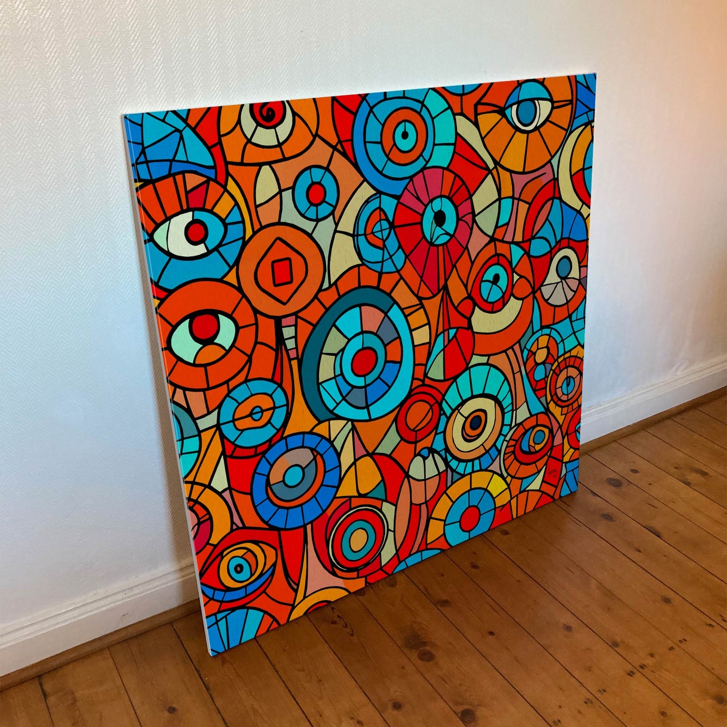 Tirage sur toile 100×100 cm de l’œuvre "Iris", image impressionnante d’iris humains stylisés, aux nuances organiques et hypnotiques.