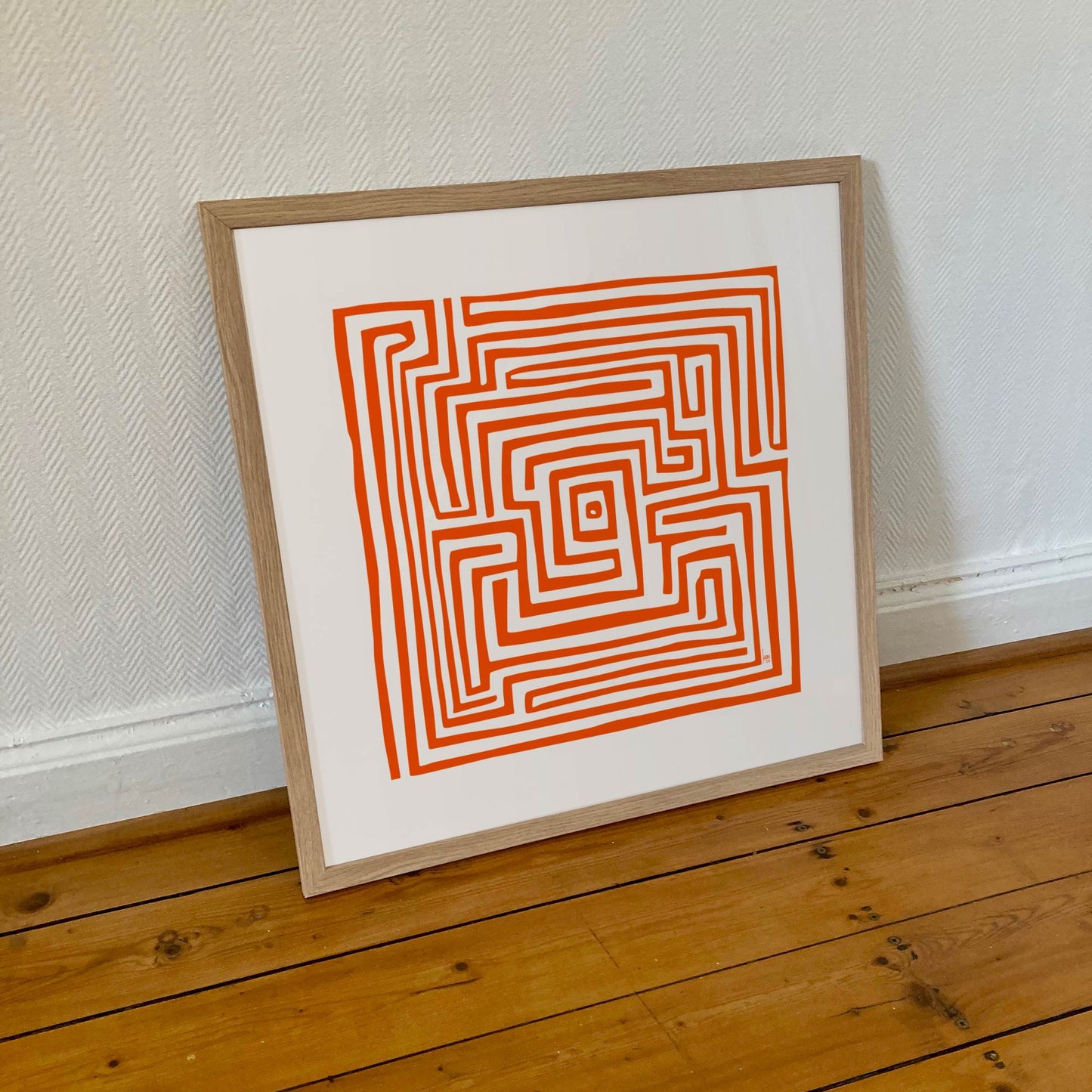 Labyrinthe Orange encadré 50×50 cm, motif plus compact, palette chaude orangée