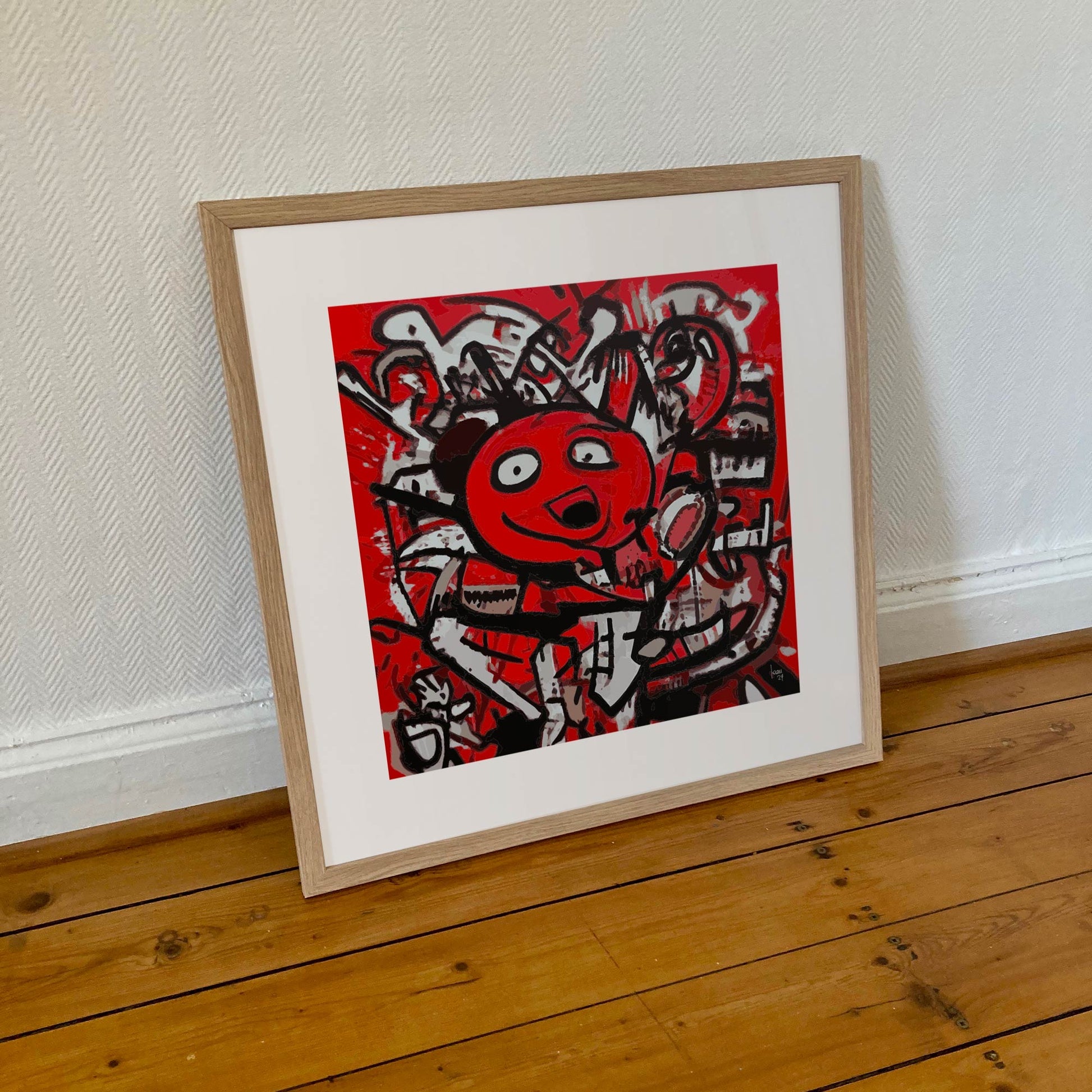 Œuvre "DINGO" encadrée en 50x50cm, personnage déjanté en rouge, noir et blanc, cadre en bois clair, style art urbain abstrait audacieux, 2024