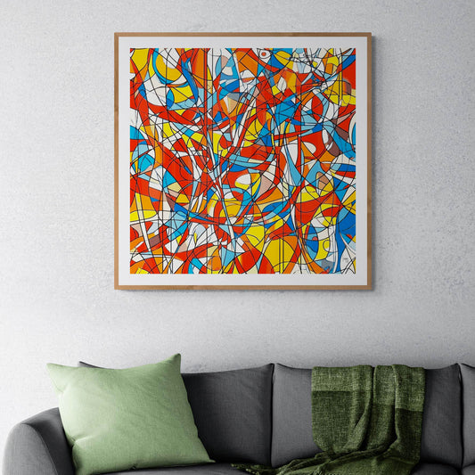 Œuvre 'AGITATION' encadrée exposée dans un salon moderne, lignes noires et couleurs rouge, bleu, jaune, orange, décoration intérieure vibrante, 2024