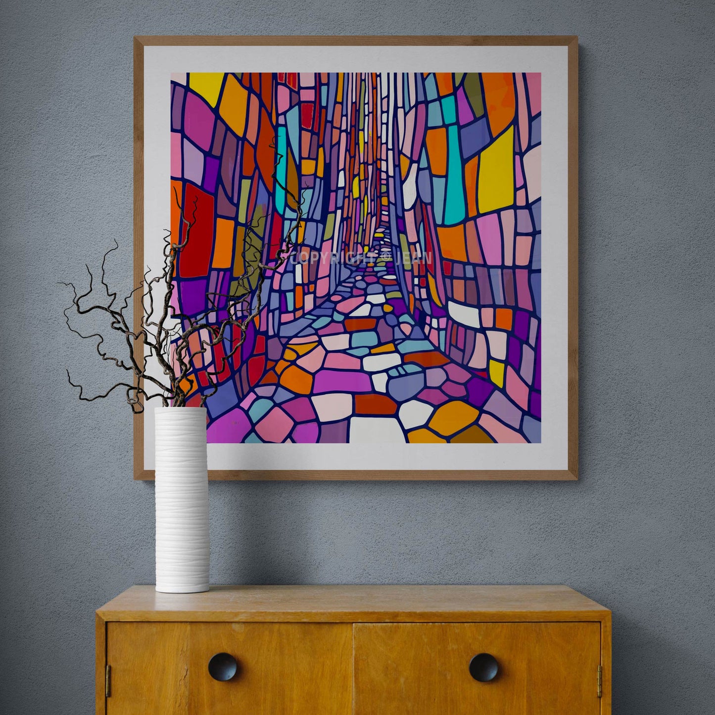 Présentation murale de l'œuvre "Bari" encadrée dans un intérieur contemporain, mettant en valeur ses teintes vibrantes