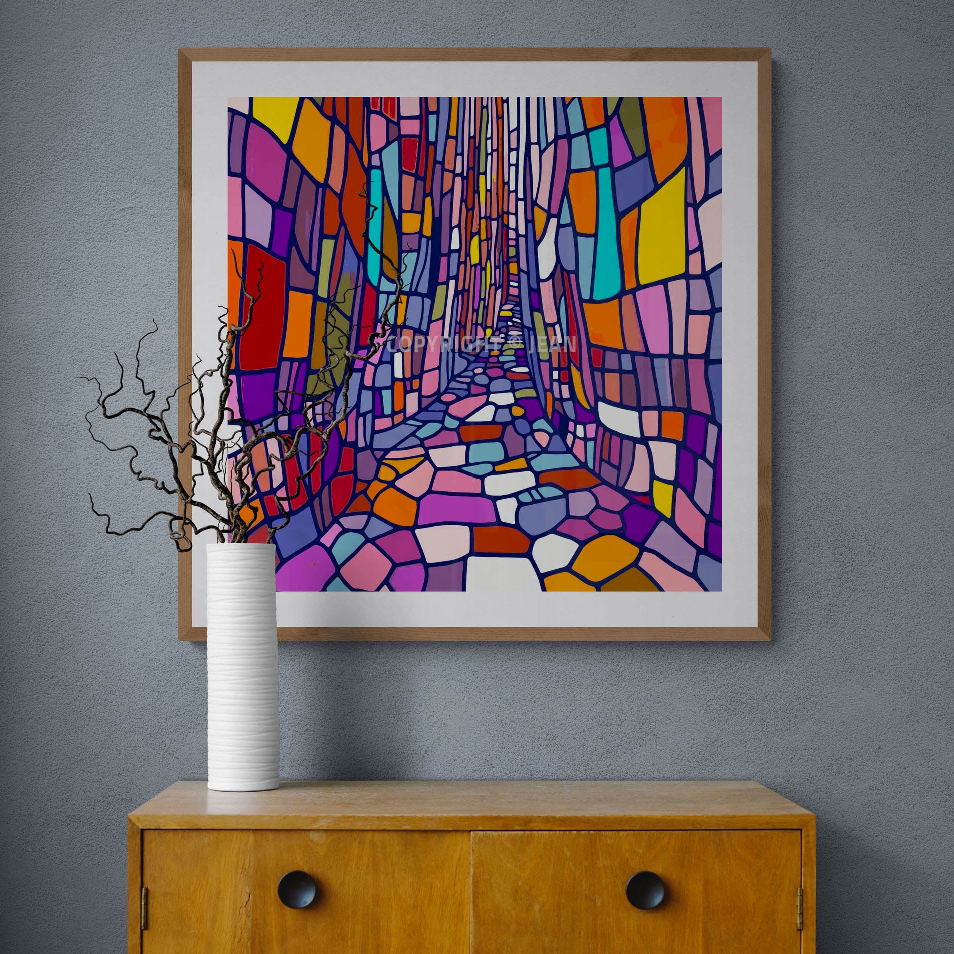 Présentation murale de l'œuvre "Bari" encadrée dans un intérieur contemporain, mettant en valeur ses teintes vibrantes