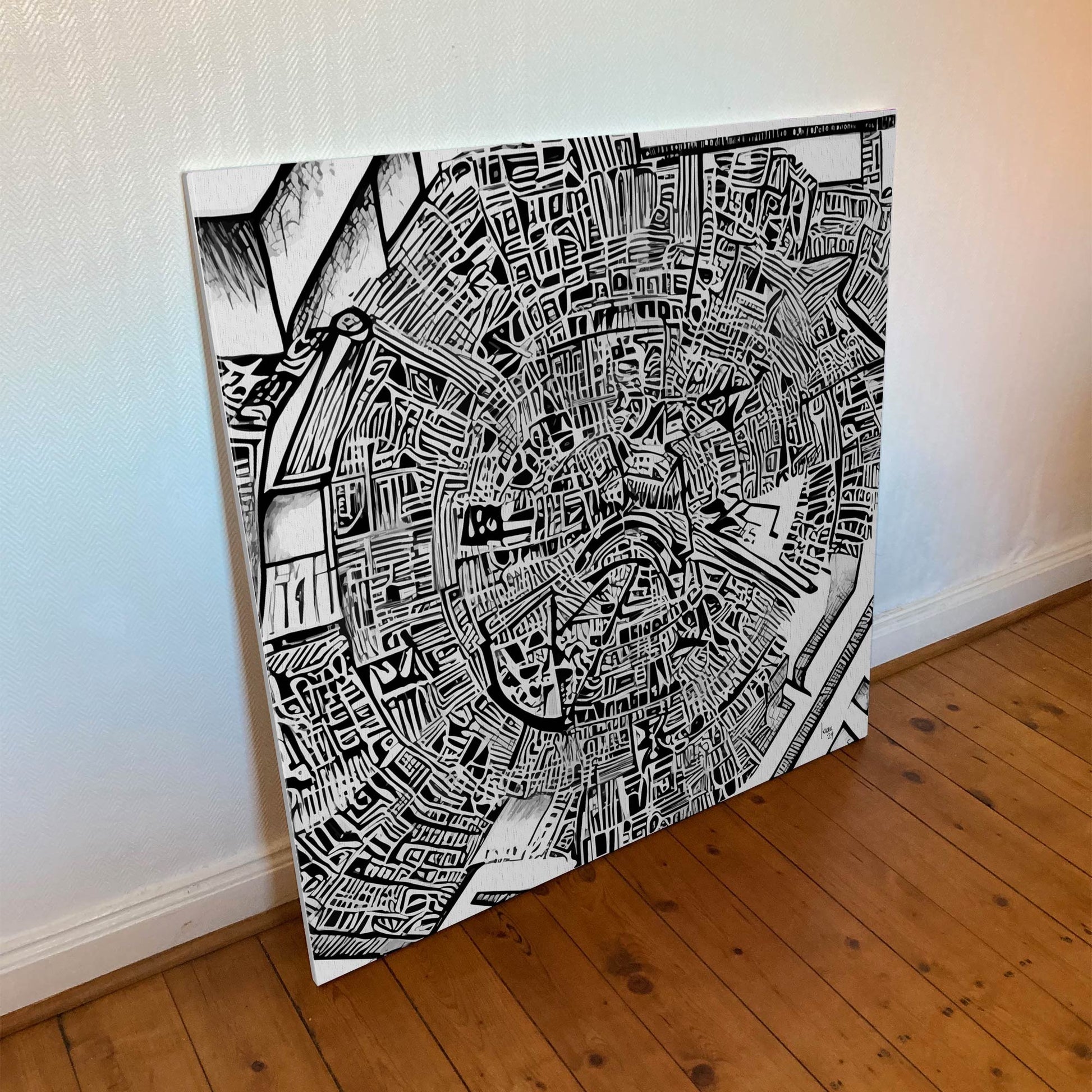 Tirage sur toile 100×100 cm de l’œuvre "Matrice", dessin abstrait en noir et blanc aux motifs complexes et aux courbes entrelacées.