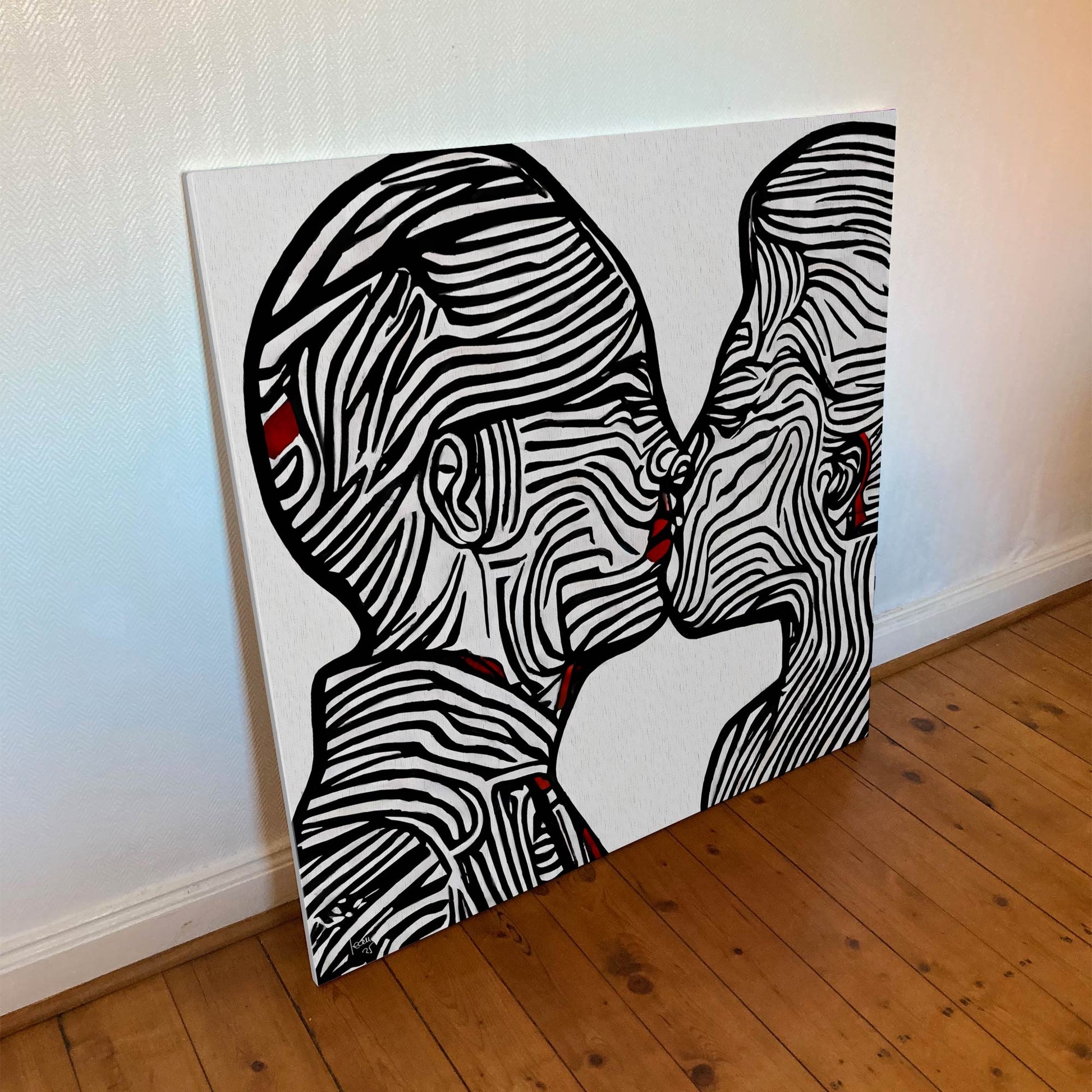 "Ondes" montrant les lignes graphiques ondulées en noir, blanc et rouge.