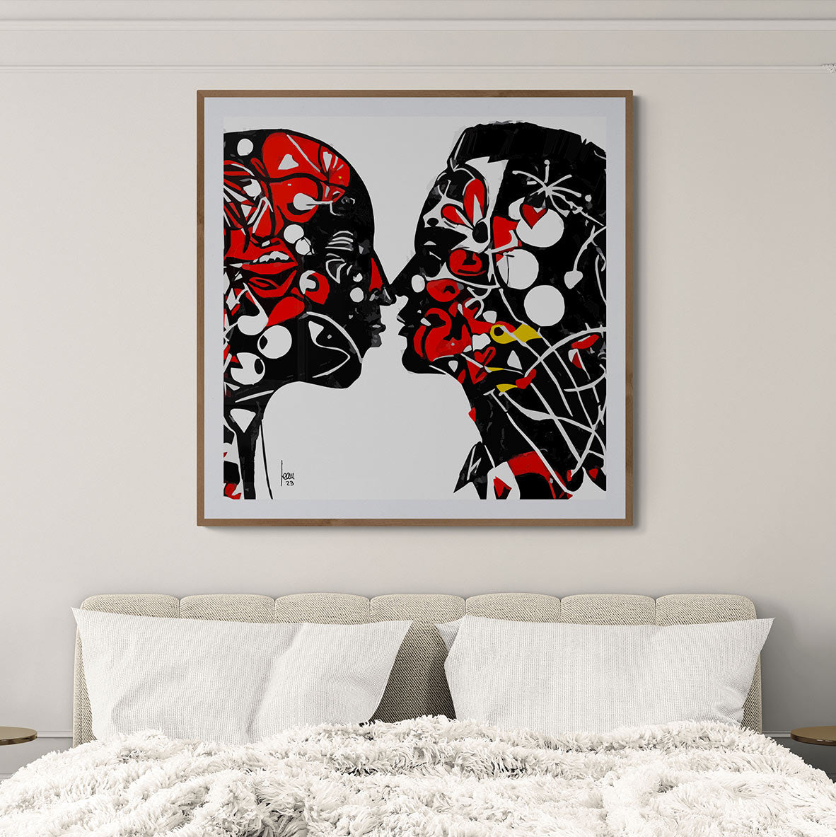 Art numérique abstrait noir/blanc/rouge – deux silhouettes de visage se faisant face, 'Nos Pensées' exposé encadré par Limonade Bleue