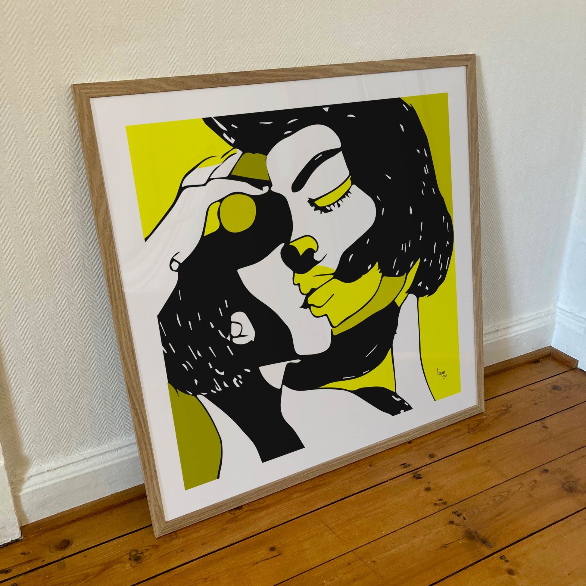 "La Tendresse" tirage d'art encadré 70x70cm, papier haut de gamme. Art contemporain abstrait et achat en ligne, deux personnages qui s'embrassent noirs et jaunes